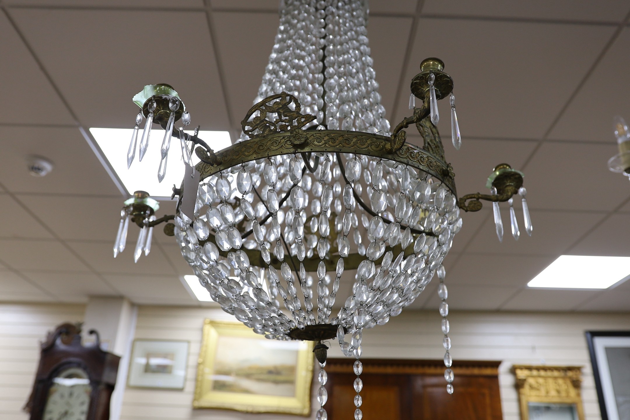 A bag chandelier with neo-classical arms